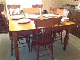 Antique Oak Table w/ 3 Leaves & 6 Pressed Back Chairs