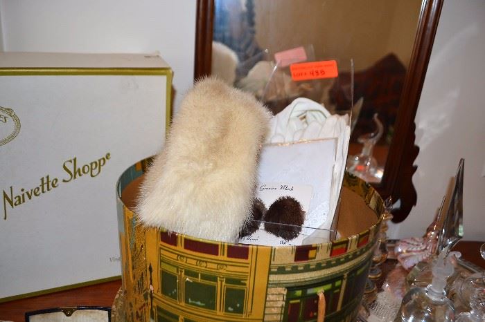 Fur mink hat, white gloves, mink clip earrings and more
LOT 435