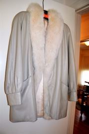 Ladies coat in pale grey leather with white mink fur collar, labeled Alan Furs, Richmond, VA 32"L.  Unsized - appears to be ladies size 10-12
LOT 441
