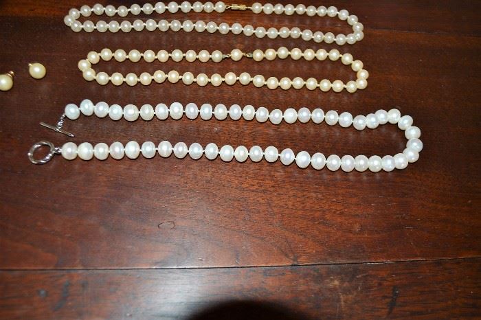 3 strands of pearl necklaces and set of pierced earrings
LOT 455