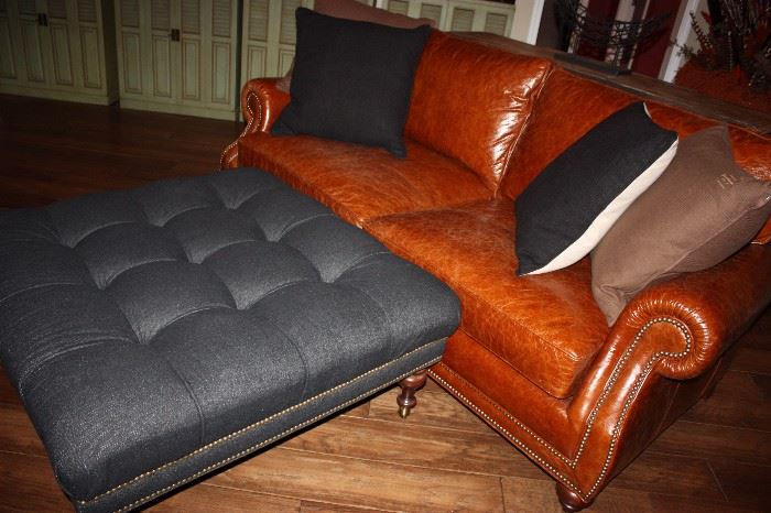 Leather sofa with nail heads/tufted coffee table on wheels