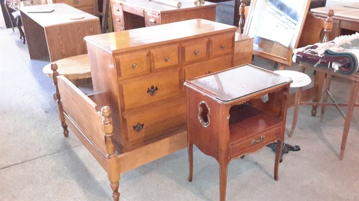 Maple twin bed and dresser with mirror.  Assorted small tables.