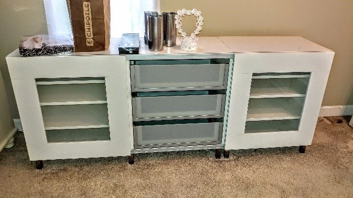 Ikea cabinet with two slider doors and 3 drawers