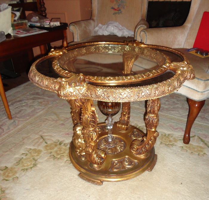 Pair of ornate gilded and glass topped tables - excellent condition.