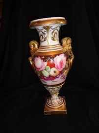 Beautiful vase was probably part of a triple garniture.  Partially hand painted and in lovely condition.