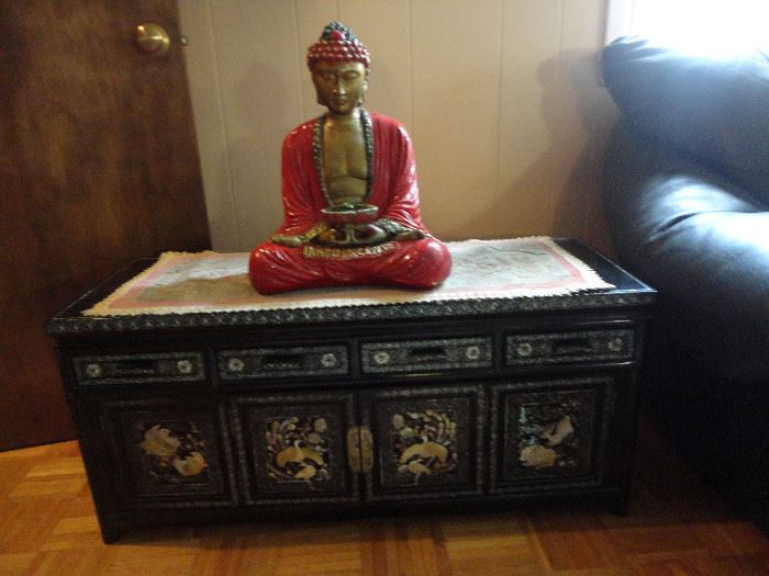 Inlaid Chinese chest and Hindu Buddha
