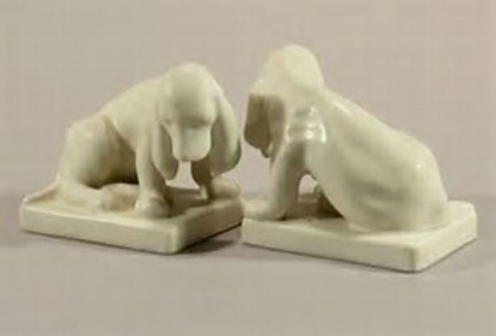 Pair of vintage Rookwood white dog bookends