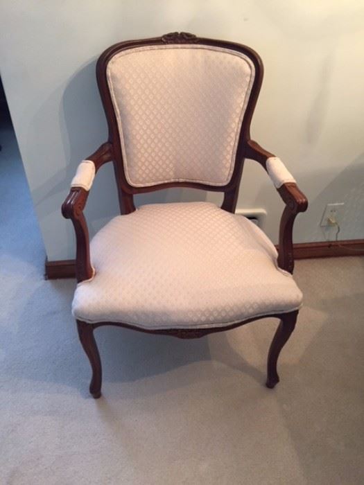 Mid Century Armchair With Decorative Back.
