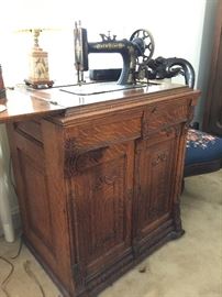 Antique New Home parlor sewing machine 