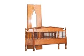 Jenny Lind Full-Size Wooden Bed Frame: A vintage Jenny Lind full-size wooden bed frame featuring a matching headboard and footboard and shaped side rails. It features cone-shaped finials and peaked headboards with turned spindle accents. It is constructed of solid wood with a honey maple finish. No frame slats or hardware are included.