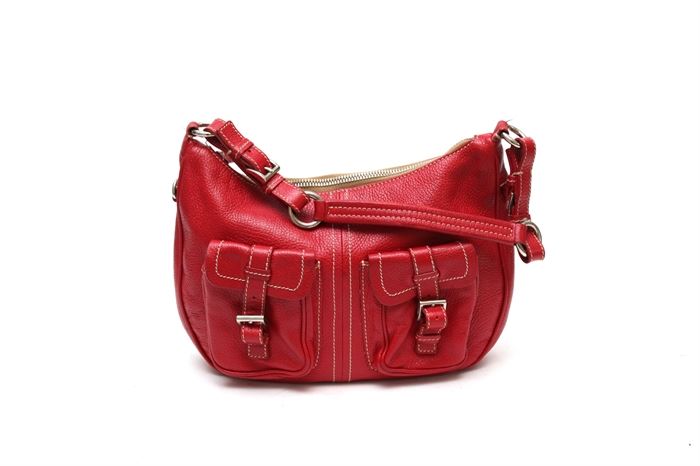 Prada Red Pebbled Leather Hobo Handbag: A Prada red pebbled leather hobo handbag. This handbag is accented with white stitching throughout and features two pockets to the exterior with buckle closures, and buckled strap and ring with silver tone hardware. The bag has a zipper top, and the interior has signature lining with a zippered pocket with Prada enameled metal signature label. Made in Italy.