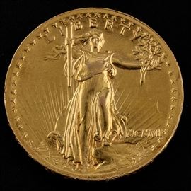 1907 High Relief-Wire Edge Variety St. Gaudens $20 Gold Coin: A 1907 High Relief-Wire Edge Variety St. Gaudens $20 Gold Coin. Designer: Augustus St. Gaudens. Mintage: 11,250. Metal content: 90% Gold, 10% Copper. Diameter: 34 mm. Weight: approximately 33.4 grams. The coin is circulated and in fair condition. There is a spot on the top edge of the coin that appears to have been filed indicating that this may have had a bale attached at one time and used in jewelry.