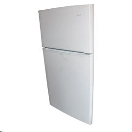 Admiral Refrigerator: An Admiral refrigerator. The refrigerator is model LTF2112ARW, and it has a white finish. The interior has glass shelves and clear plastic food storage bins.