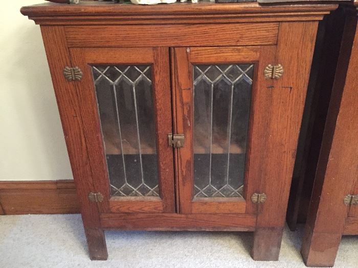 Have a pair! These are finished in the front and one side. They finished a banister so one side would slip into it. These were built ins. They are gorgeous and have thick leaded glass!
