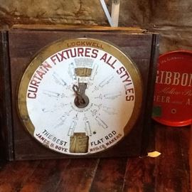 Primitive Sales Display for ordering curtain rods.