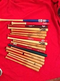 Miniature souvenir bats, sizes vary, approximately 16 inches