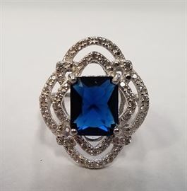 4 Ct blue sapphire & diamond SS ring