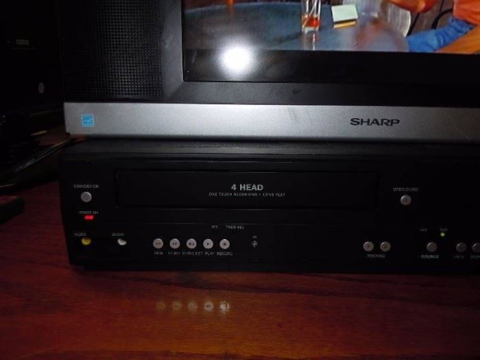 
Flat Screen TV with Combo DVD/VCR Player