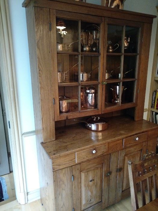 Remarkable primitive walnut step back cupboard. Original glass!