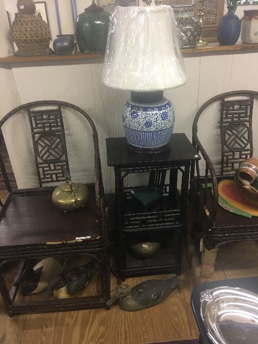 Pair of 19th century armchairs and matching table, working decoys, fine porcelain vase lamp, green Thai vase lamp, handwoven basket.