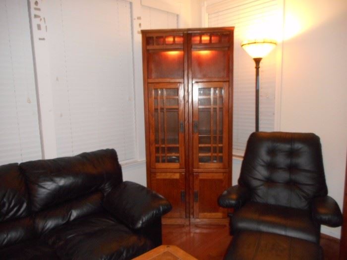 Mission Style Lighted Cabinets, these are seperate units Black Leather Couch