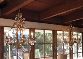 Pair of Hollywood Regency Gilt Crystal Swag Chandeliers