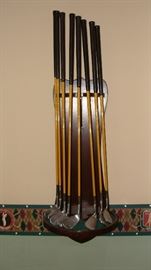 Antique wood golf clubs display