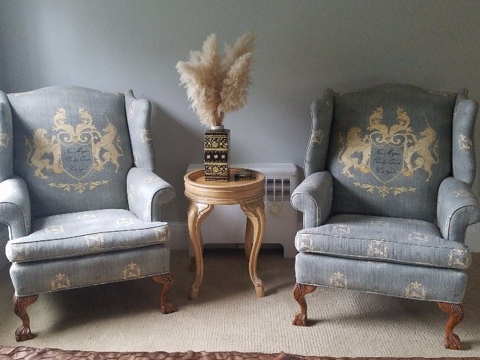Two Grey and Camel Wingback Chairs 
Two matching ottomans coming soon
Yellow and Black Covered Tall Porcelain Jar
Beverly Lenore Side Table 18inD25H