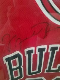 Authenticated and framed Michael Jordan Bulls jersey plus so many more Bulls and Bears signed photographs.