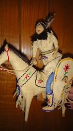 Leather beaded horse and Indian. 