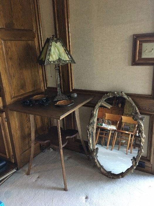 Antique table, heavy oval mirror with bird/twig frame