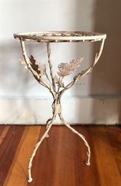 Small plant stand with scrolly leaves