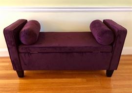 Upholstered storage bench with pillows