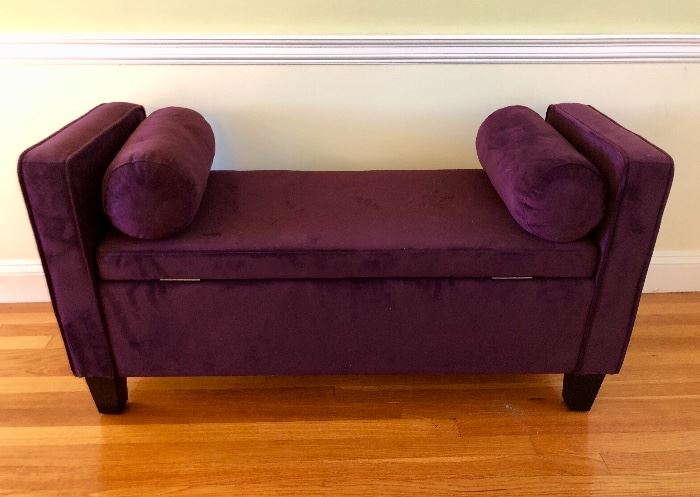 Upholstered storage bench with pillows