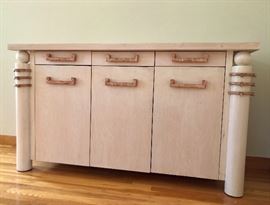 Side buffet featuring metal hardware and accents