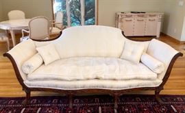 Antique, down filled Federal style sofa, carved legs