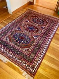 Another beautiful Persian rug... this one missing a bit of fringe...