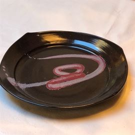 Signed pottery plate