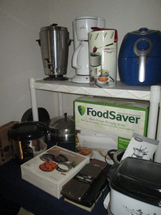New in box  FoodSaver, rice cooker, vintage electric frying pan, vintage coffee urn, lots of fondue pots and forks and more