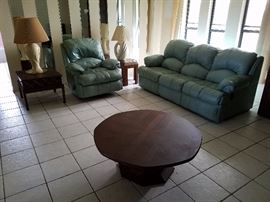 Leather dual recliners and recliner chair. Need a little cleaning, but no rips, tears, and operate nicely.