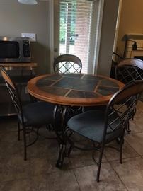 #8	Round Tile/Top Wood/Metal Table   48roundx30Tall	 $175.00 
