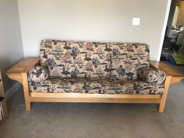 #48	Futon w/flip up side table arms  82" wide	 $100.00 
