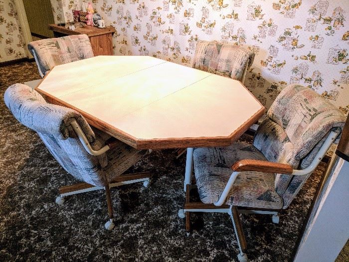 kitchen table with rolling chairs