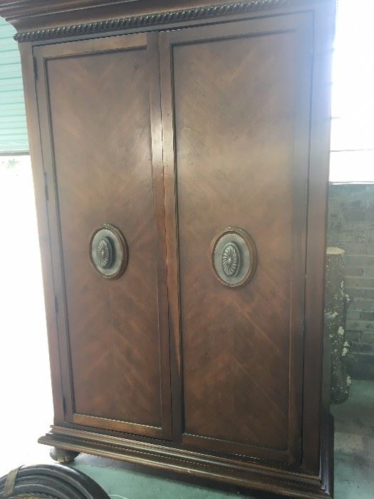 This is a Heirloom piece by Thomasville in the Earnest Hemmingway Collection.  Inside the back has been cut out to accommodate a Television but could ofcourse be used as for storage. 