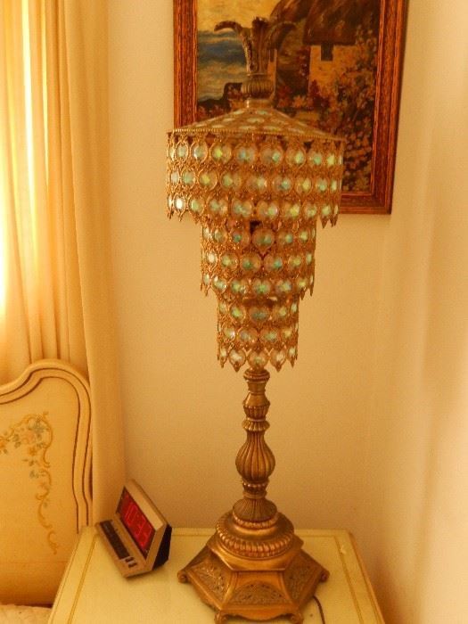 Great example of Hollywood Regency lamp. Note oil on canvas on wall French cottage.