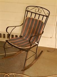 1 of 2  iron rocking chairs