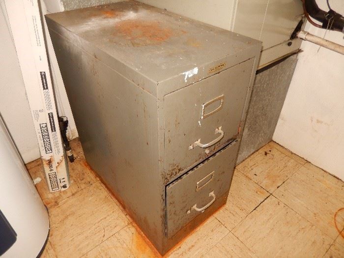 Heavy duty file cabinet. Needs repainted
