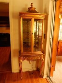 Gilt painted curio cabinet lighted