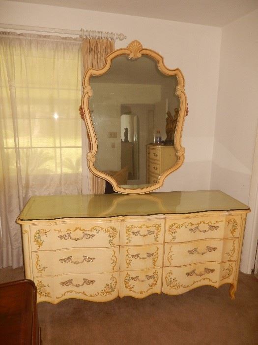 Triple  dresser with matching floral painted design and mirror. Note: cut glass top