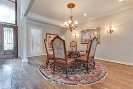 6 Henredon Dining Chairs and Glass Round Table on Wood Pedestal 66.5 inches in diameter. Round Oriental Rug